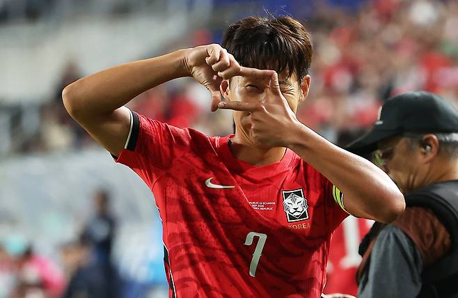 Son Heung-min celebrates after scoring during Korea's friendly against Ecuador at Suwon World Cup Stadium in Gyeonggi on Sept. 24. YONHAP
